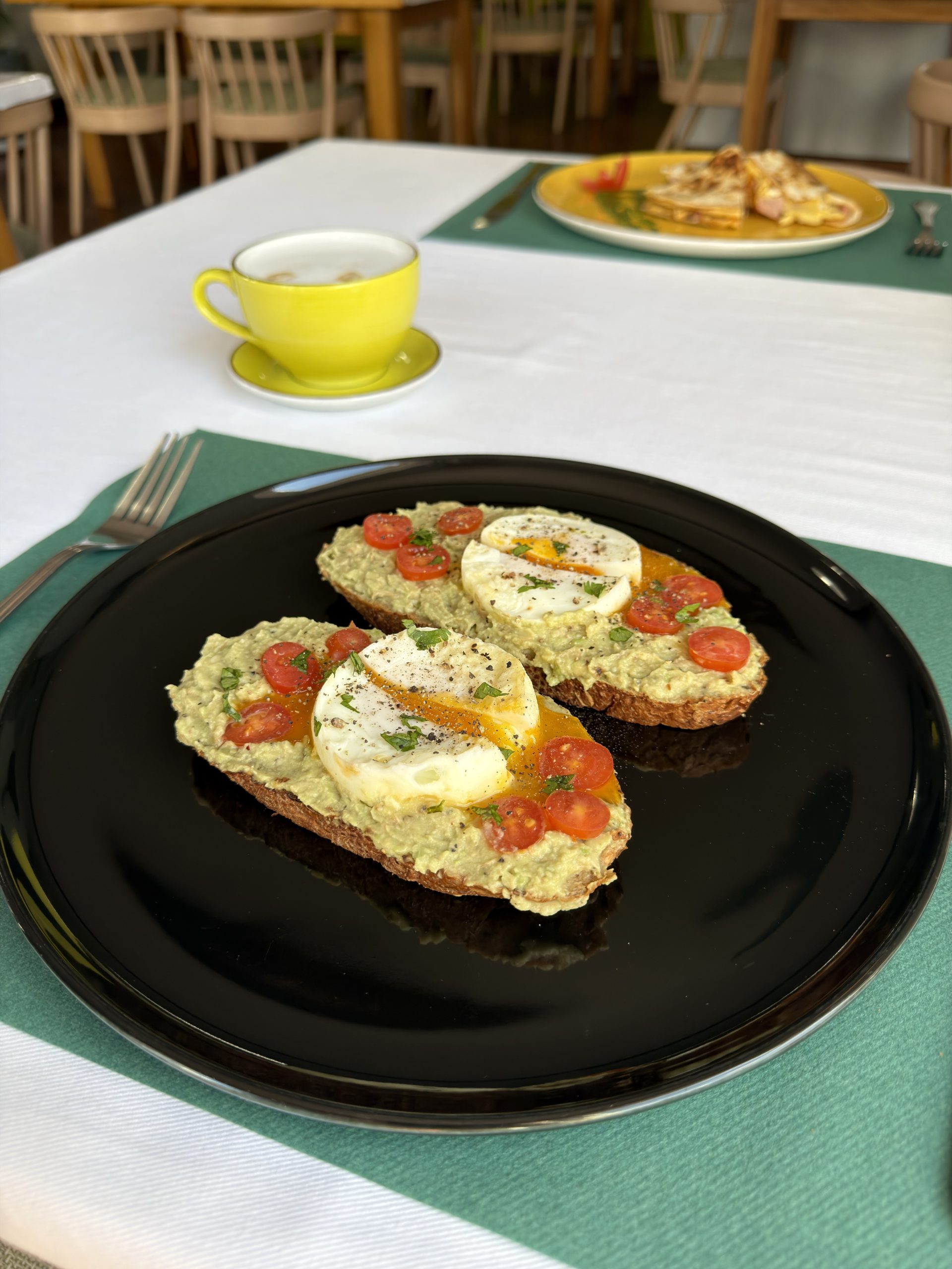 Avocado toast with poached egg and tomato at Dinner@langholm, Walvis Bay
